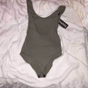 Green low side body suit